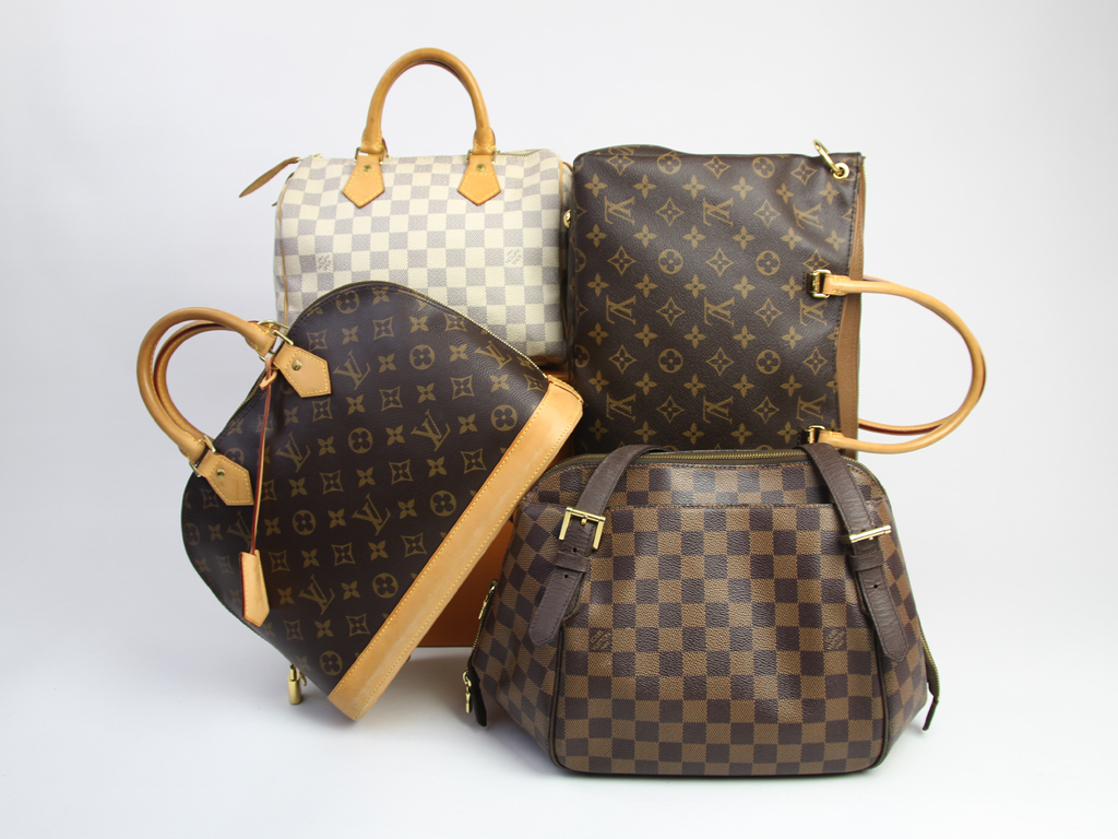 Foto de quatro bolsas Louis Vuitton para post sobre a marca